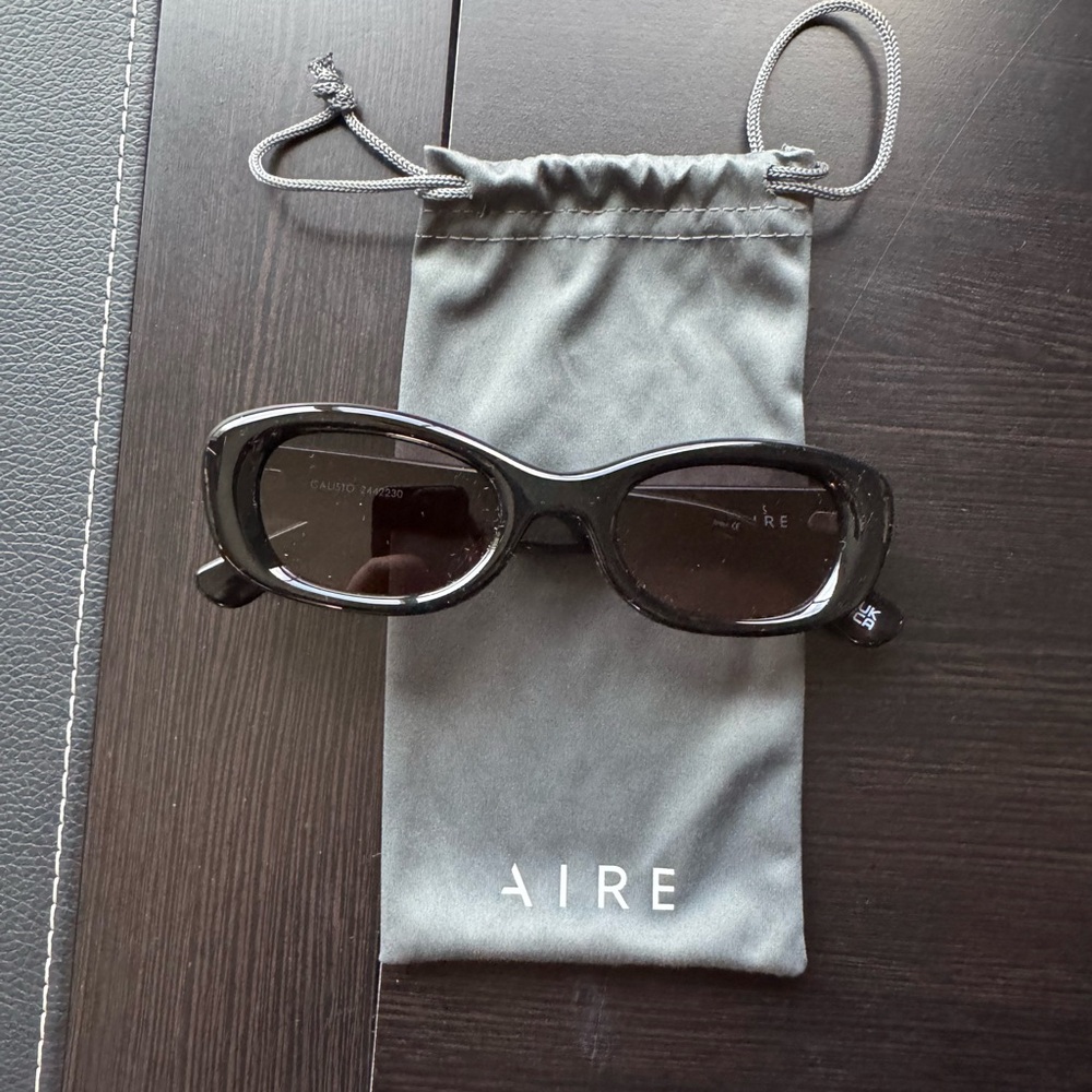 AIRE Black Calisto Oval Sunglasses